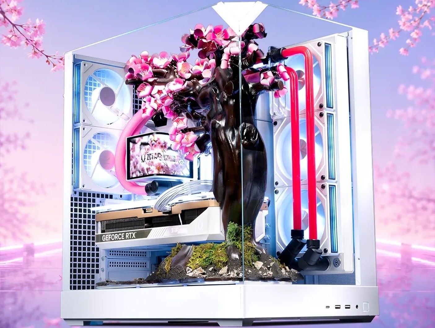 A photo of the Cherry Blossom PC from an angle, showing the water-cooling pipes.