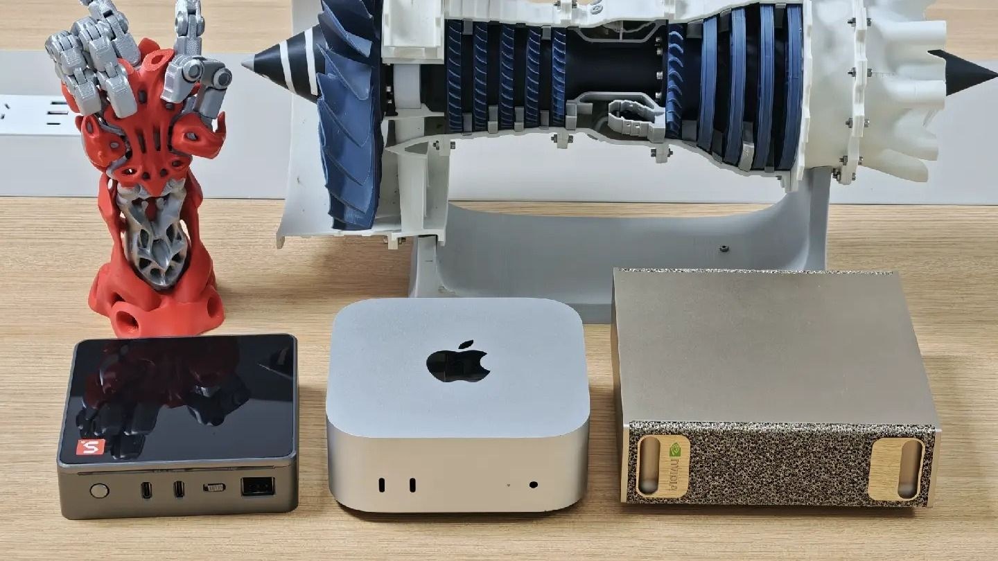Sipeed MaixStation mini PC beside an Apple Mac mini and an Nvidia DGX Spark on a desk